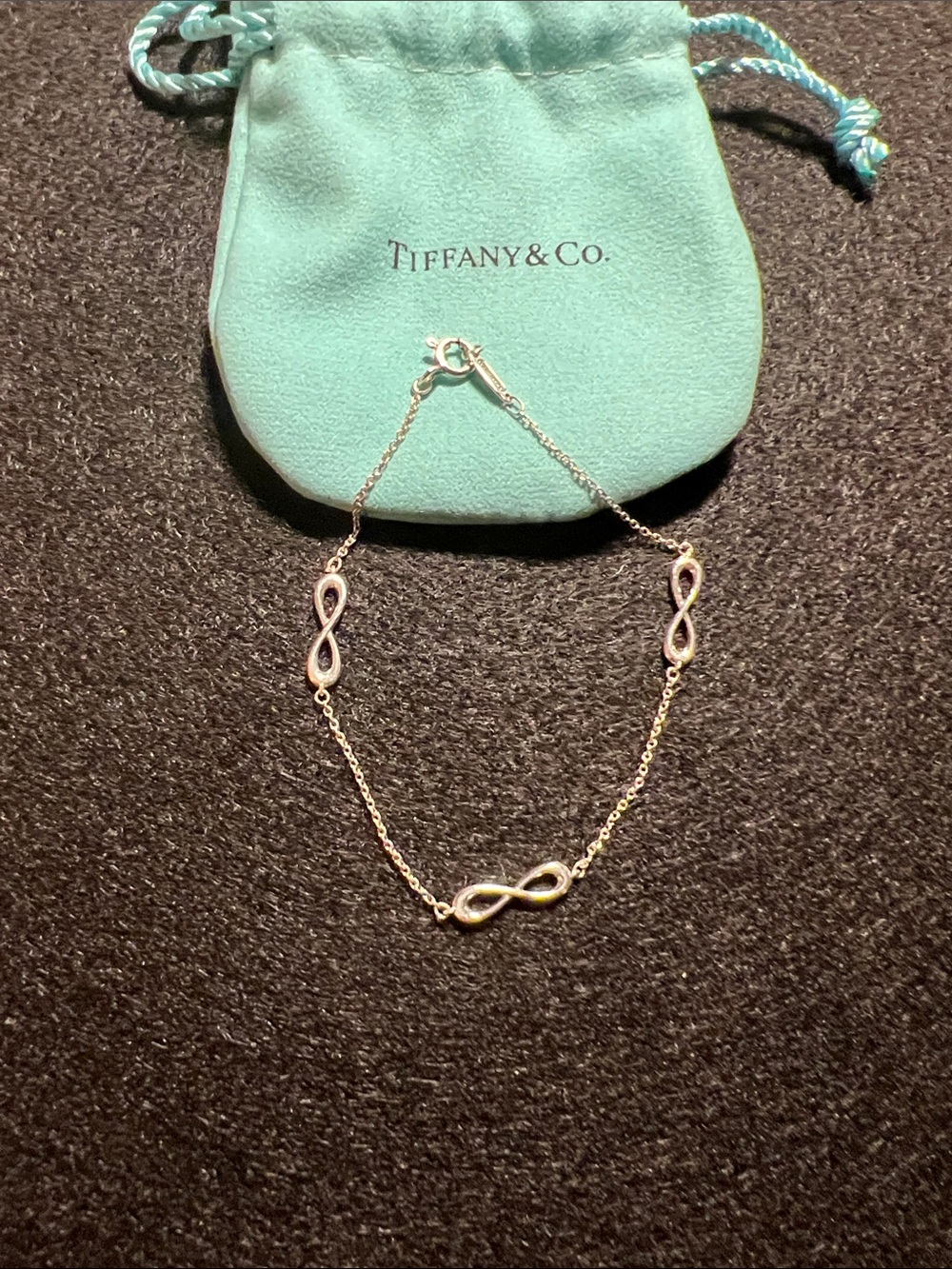 Tiffany & Co. 925 Silver Infinity Link Bracelet with Signature Blue Pouch